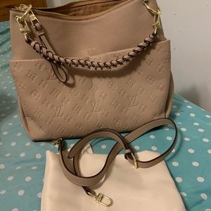 Beige Louis Vuitton purse